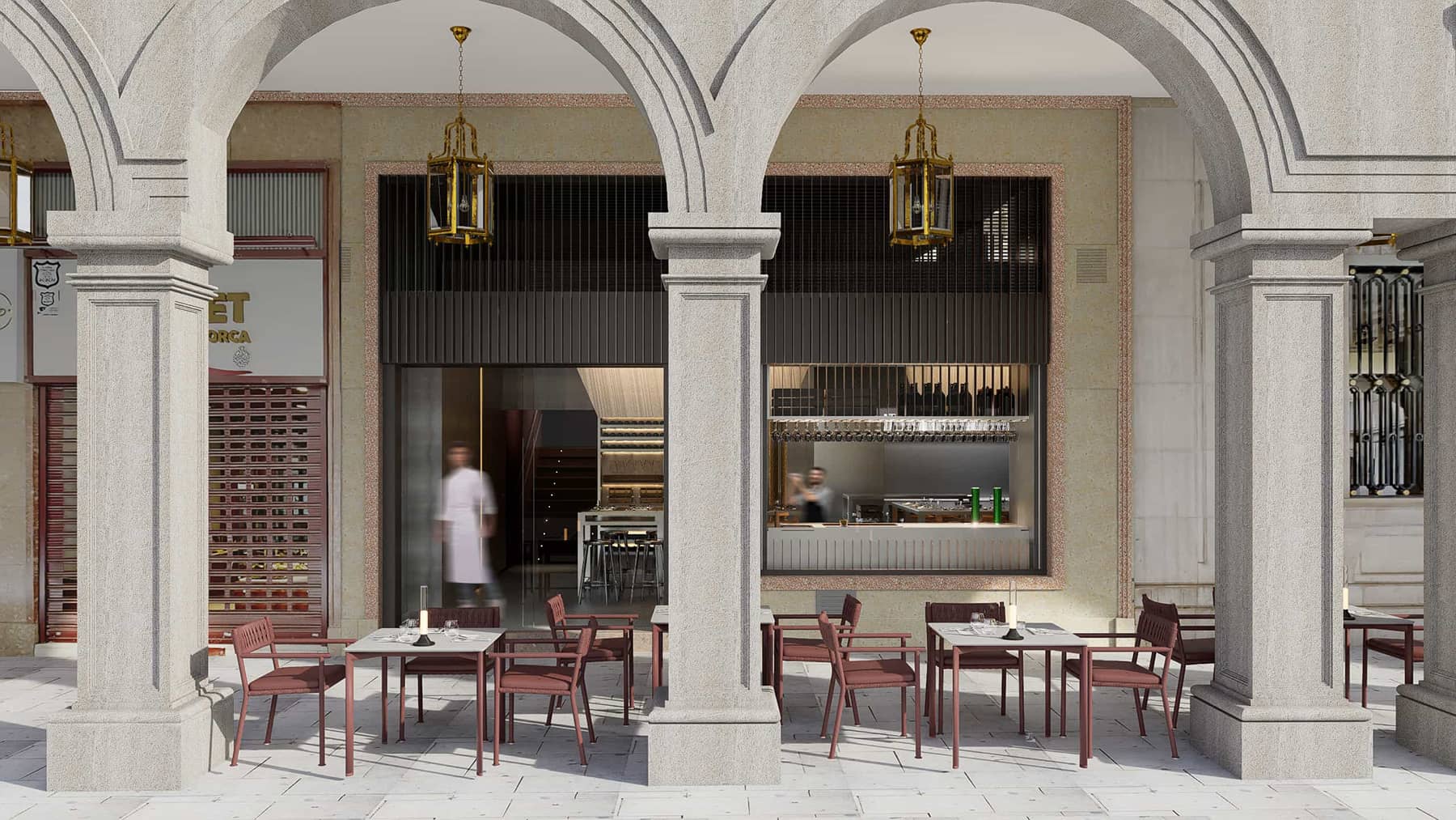 Vista exterior bajo los arcos históricos de la terraza del Restaurante Trescero en Granada, equipada con la icónica silla de exterior modelo Sail de Andreu World.